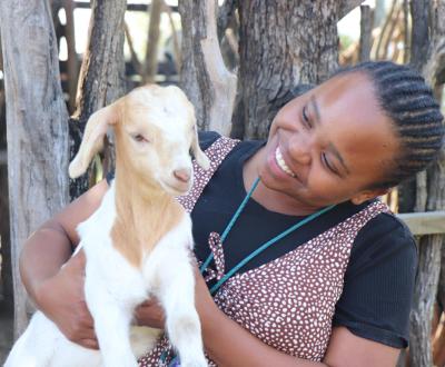 Women with a Goat