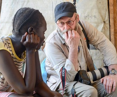 Liam Cunningham talking to a girl