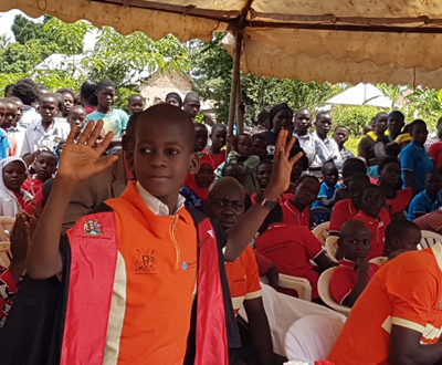 Ham officiating an event on the Day of African Child, 16th June 2019, as a child chief guest in Busia.