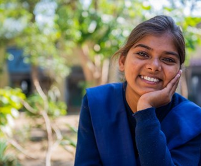 A sponsored child, Harpal from India in her school uniform.