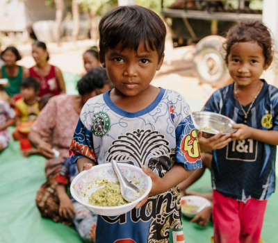 Two Childrens with food.