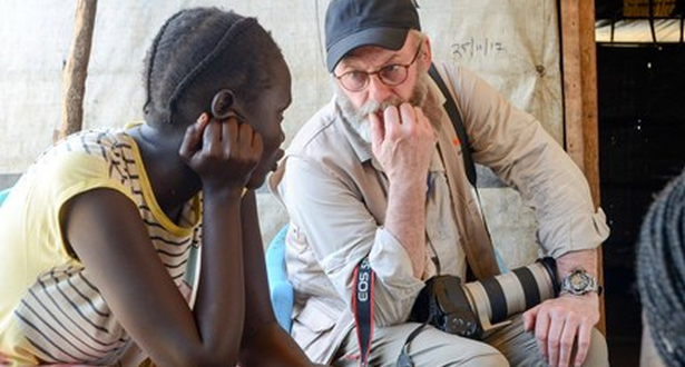 Liam Cunningham talking to a girl