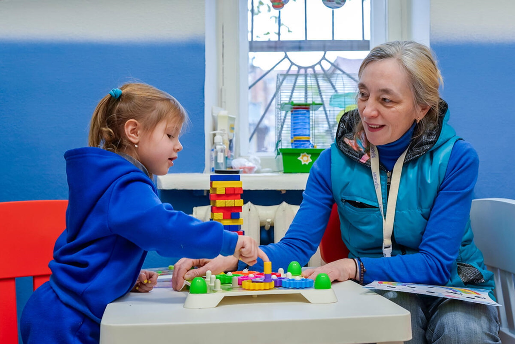 2-year-old Alexandra playing in one of our Child-Friendly Spaces in Ukraine.