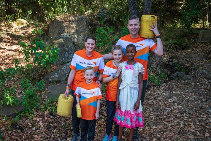 People in world vision tshirt