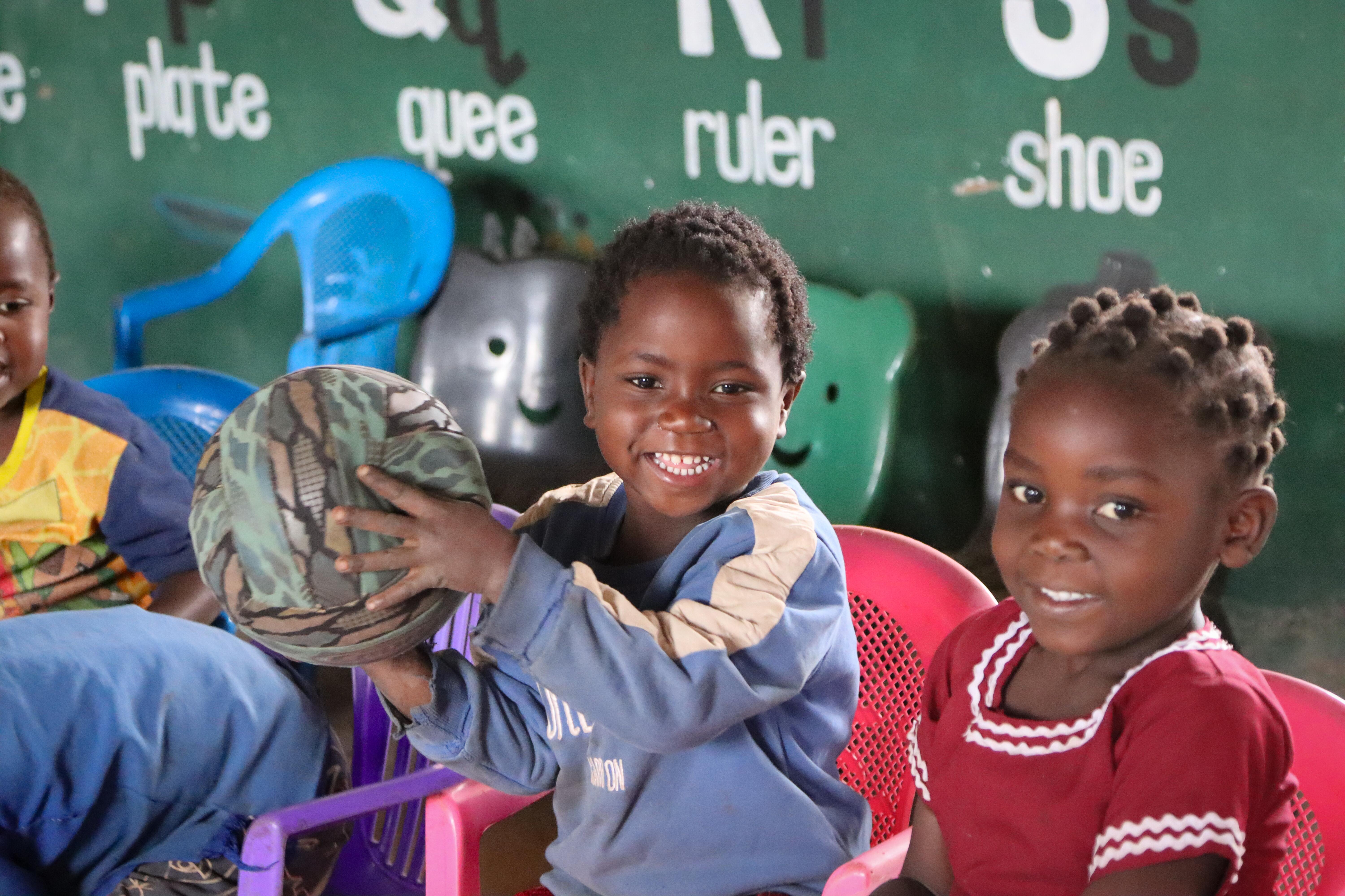 Boy from Malawi Holding Ball